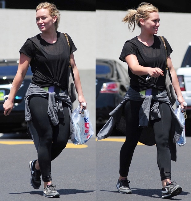 Hilary Duff sported yoga pants and a flowy top and completed the outfit with a pair of Nike Eclipse II sneakers
