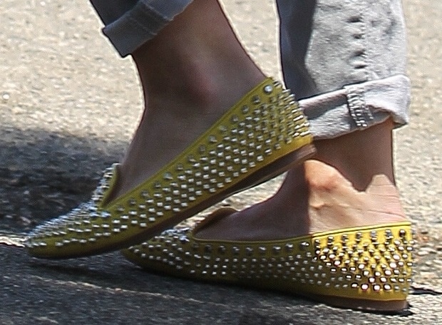 Hilary Duff's look was completed with eye-catching yellow studded smoking slippers from Prada