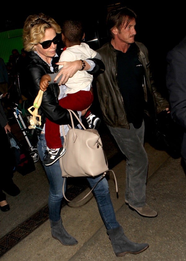 Charlize Theron with Sean Penn and son Jackson at the Los Angeles International Airport on May 30, 2014