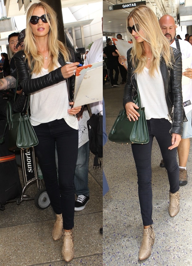 Rosie Huntington-Whiteley shows how to style python Saint Laurent ankle boots with skinny jeans, a white tee, and a leather jacket for effortless airport chic
