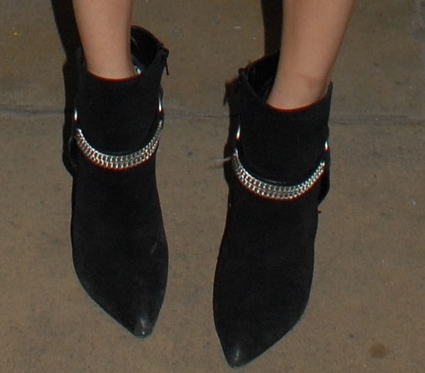 Poppy Delevingne wearing Saint Laurent boots
