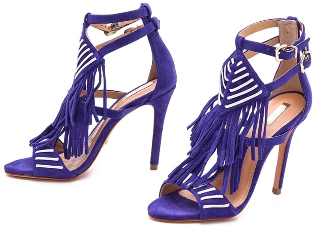 Woven accents and soft fringe lend bohemian charm to suede Schutz sandals