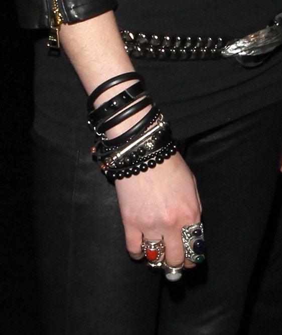 Taylor Momsen shows off her numerous bracelets and rings