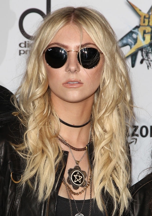 Taylor Momsen wears Ray-Ban sunglasses and several rockstar necklaces