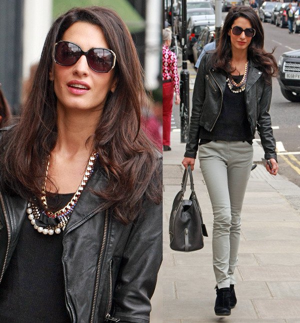 Alamuddin wearing an elegant statement necklace made of colorful stones and pearls