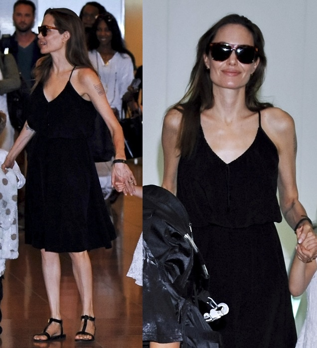 Angelina Jolie flaunted her legs in a black tank dress