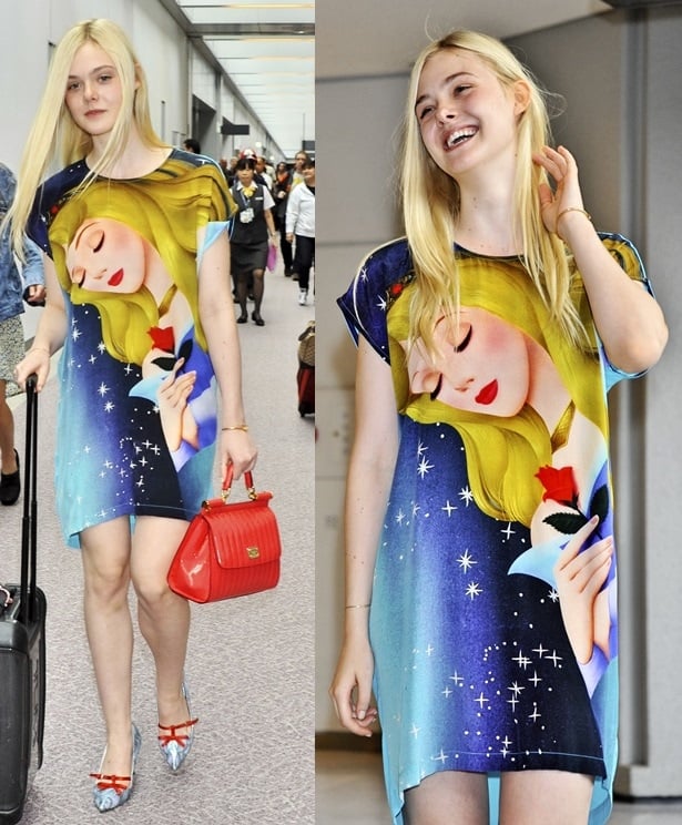 Elle Fanning in a t-shirt dress printed with Sleeping Beauty on it