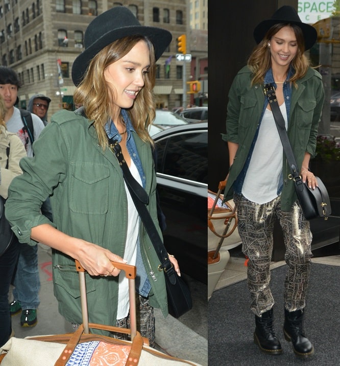 Jessica Alba wears an army jacket with Isabel Marant for H&M silk pants and Dr. Martens 1460 boots