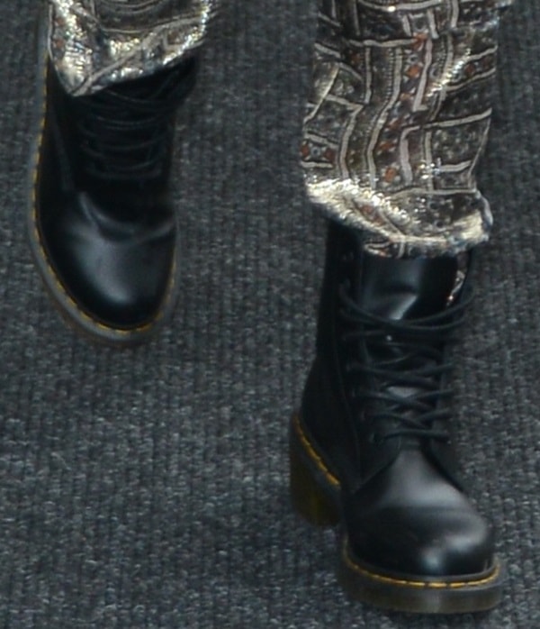 Jessica Alba rocks black Dr. Martens 1460 boots with silk pants