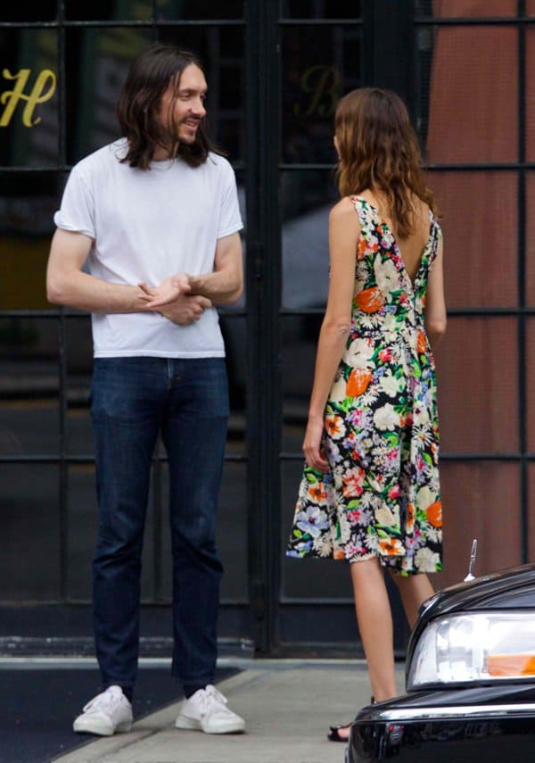 Alexa Chung wearing a floral knee-length dress in the East Village in Manhattan