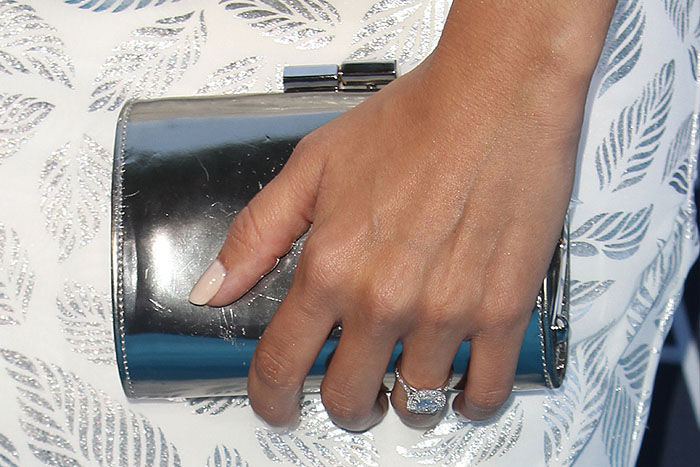 Ashley Tisdale's cushion-cut diamond engagement ring and silver clutch