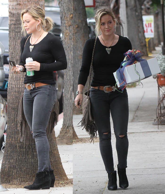 Hilary Duff was spotted at a party in Sherman Oaks on July 19, 2014, wearing J Brand Photo Ready cropped mid rise skinny jeans in Mercy paired with Belle by Sigerson Morrison Kyeran black suede ankle boots