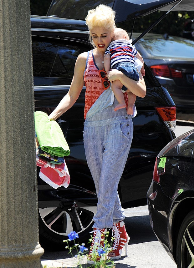 Gwen Stefani completed her look with red-and-white Jeremy Scott for adidas high-heel sneakers
