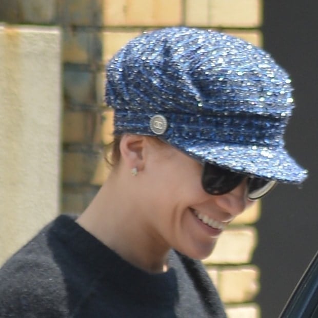 Jennifer Lopez spotted sporting a retro-style Chanel hat and a heavy top despite the summer heat as she leaves her apartment in New York on July 2, 2014