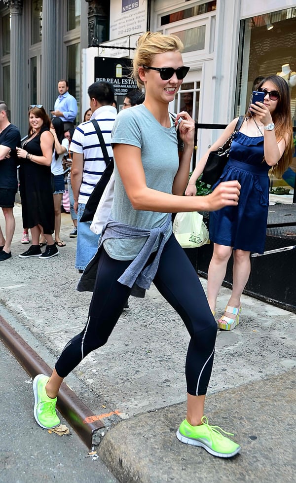 Karlie Kloss looked ready for the guy in sweatpants, a shirt, and neon sneakers