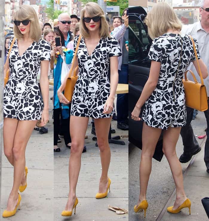Taylor Swift rocks a black and white floral romper, pairing it with bold yellow pumps and a matching handbag for a chic, eye-catching look