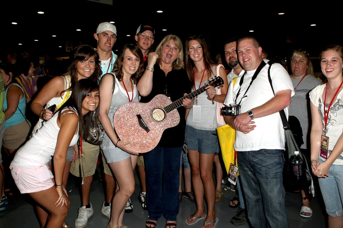 Taylor Swift's mother Andrea Swift with fans at the CMA Music Festival in Nashville in 2008