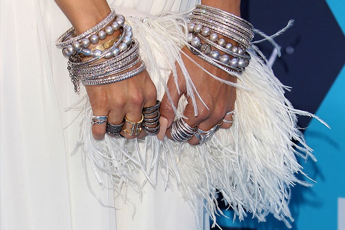 Vanessa Hudgens' Jenny Packham "Tinta" silk-and-feather clutch