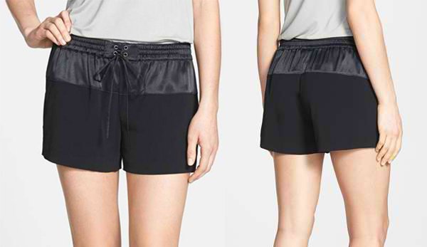 Coupled drawstrings add a lace-up detail to the satiny elastic waistline of these relaxed-fit shorts