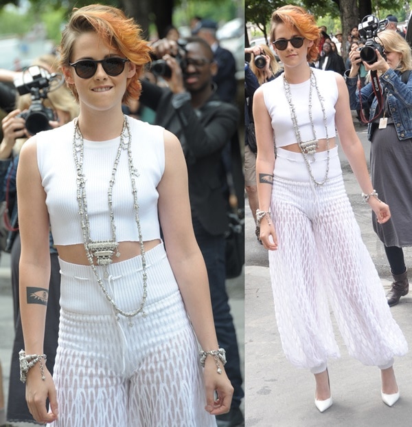 Kristen Stewart's hairstyle features a trendy short cut with a tousled, textured look
