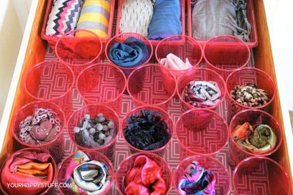 Clear plastic cups work great as containers for scarves