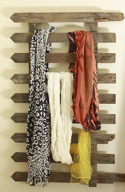Turn an old scrap of fence into a scarf organizer