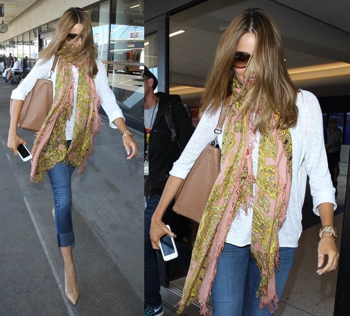 Sofia Vergara wears blue Goldsign jeans with a white sweater