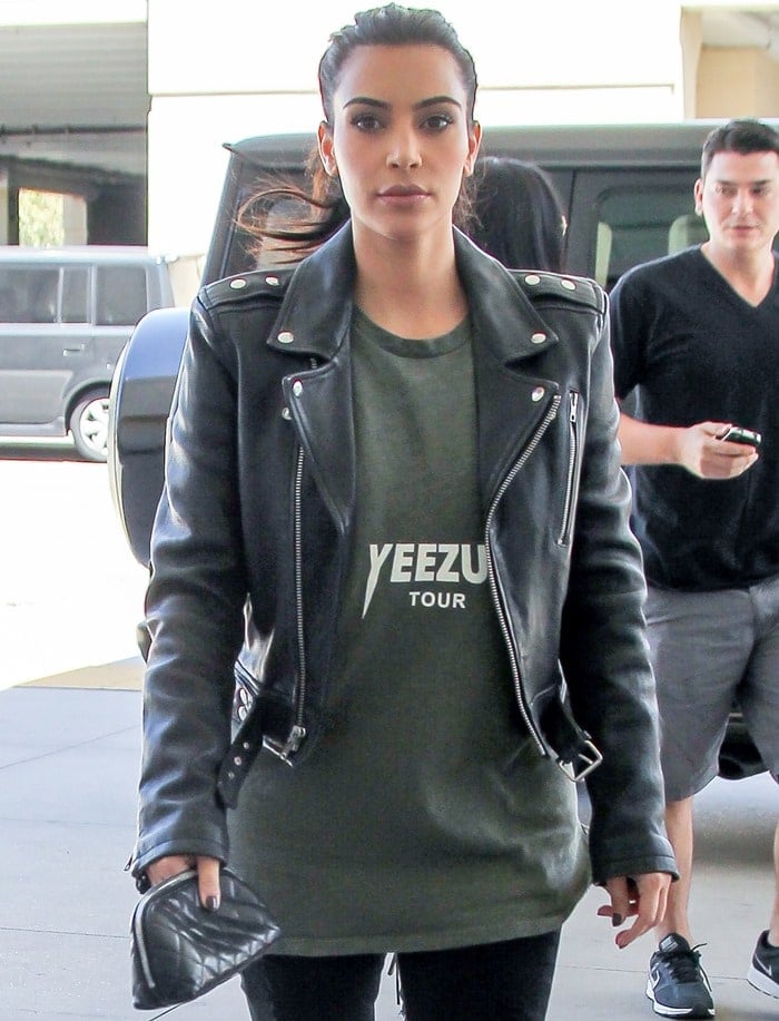 Kim Kardashian, in a glazed Blk Dnm leather jacket, shopping at Topanga Mall
