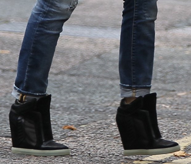 Gwen Stefani wearing L.A.M.B. wedge sneakers