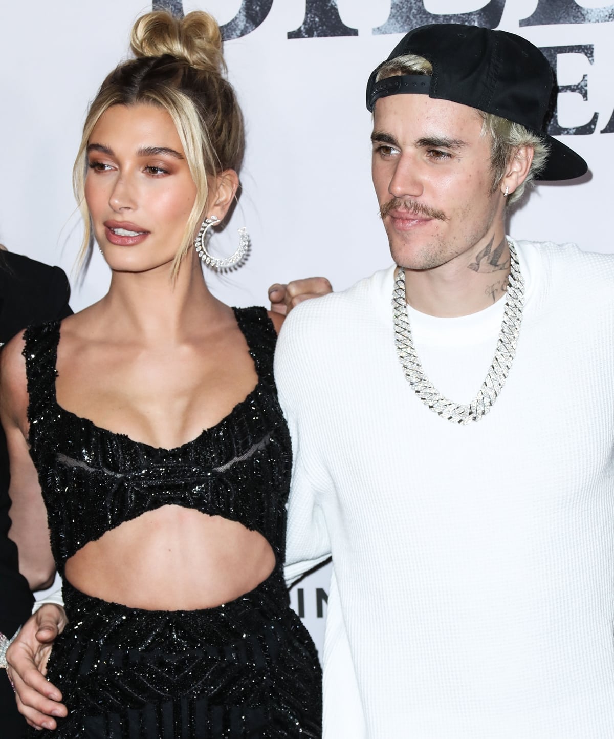 When not wearing high heels, Hailey Bieber is about two inches shorter than her husband Justin Bieber