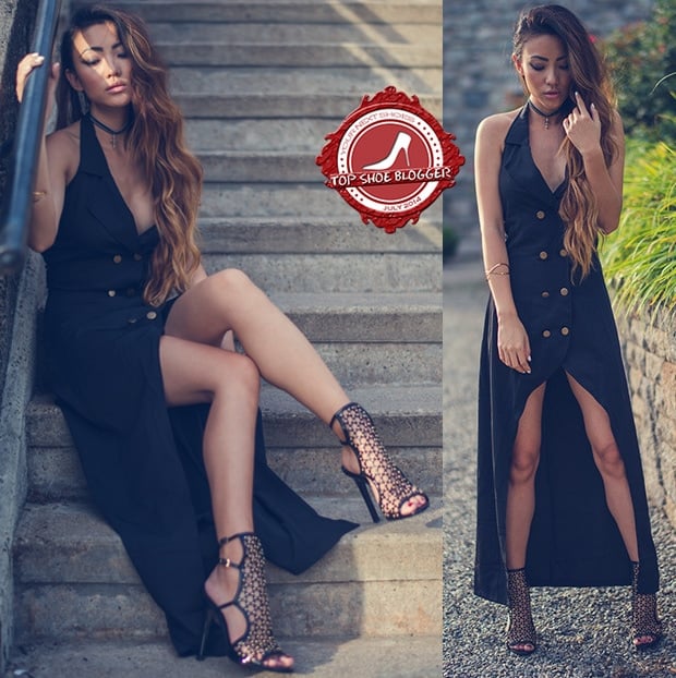 Jessica in a double-breasted vest dress and studded caged sandals