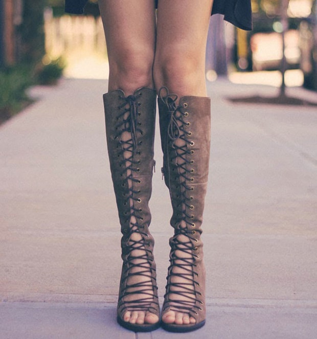 Kacie Cone's pretty toes in knee-high gladiator sandals