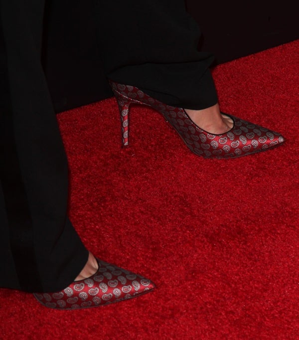 Katie Holmes reveals toe cleavage in red paisley print pumps