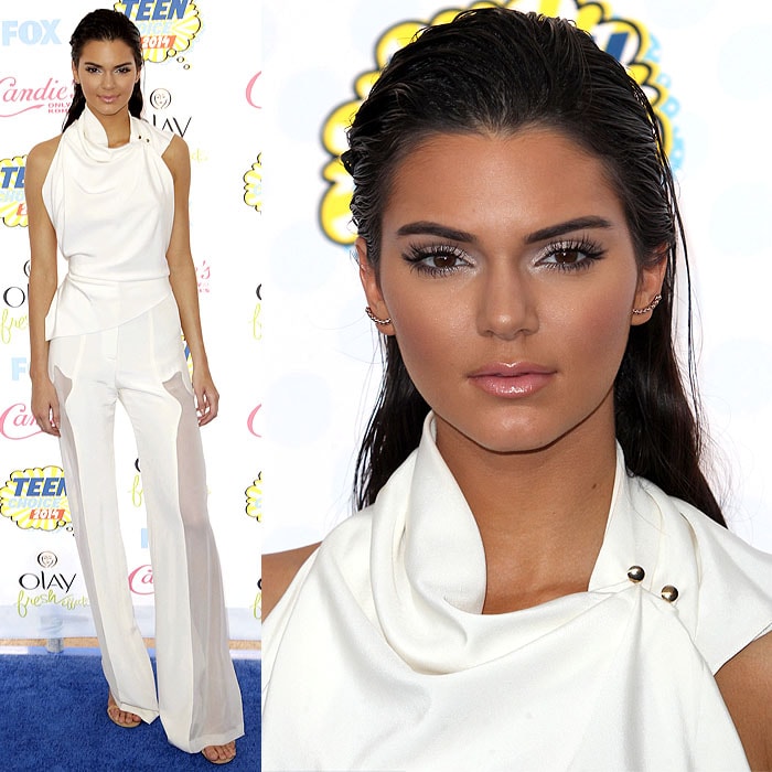 Kendall Jenner posing on the blue carpet at the 2014 Teen Choice Awards