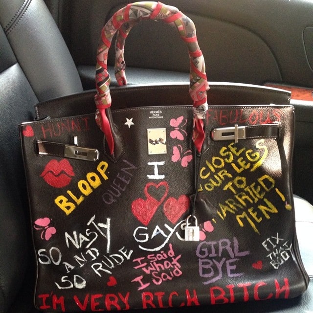 NeNe Leakes shared her personalized Birkin bag on Instagram, featuring bold statements like "I'm very rich, b*tch" and "So nasty and so rude," showcasing her unapologetic personality through colorful graffiti art