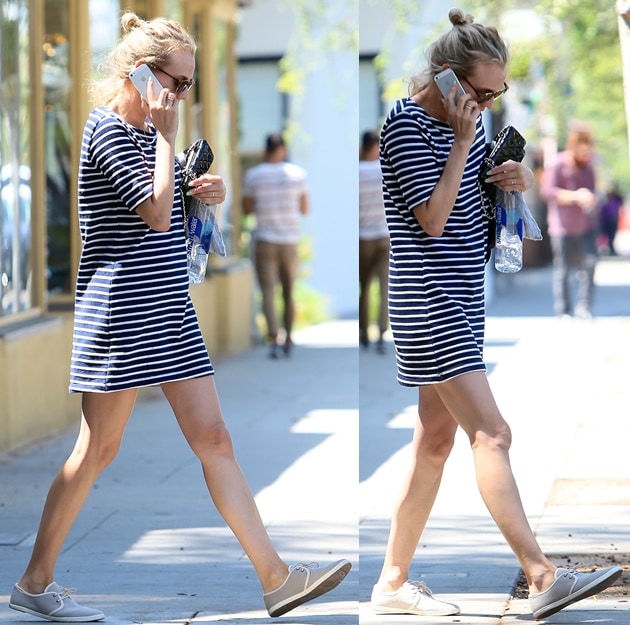 Diane Kruger wore a pair of gray lace-ups with a striped dress