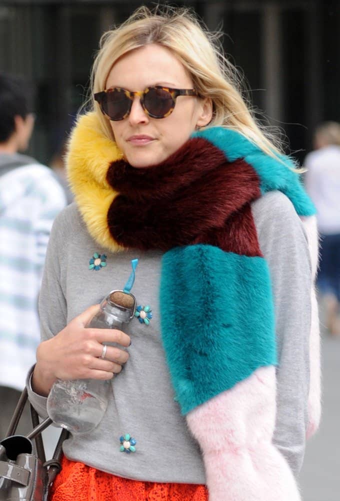 Fearne Cotton bundles up in bright pieces teamed with grey and black neutrals while on her way to Radio 1 studios in London on August 21, 2014