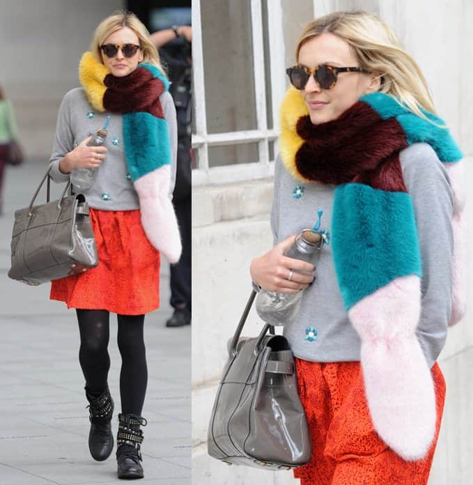 Fearne Cotton adds a bold twist to her outfit with a striking multicolored fur scarf, effortlessly blending romantic, retro, and edgy elements