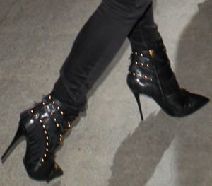 Heidi Klum Flies High in Studded and Fringed Buckled Boots