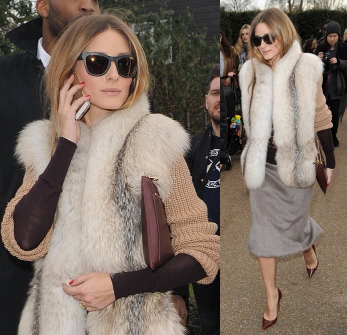 Olivia Palermo wears a fur vest as she attends the Burberry Fall 2014 fashion show in London