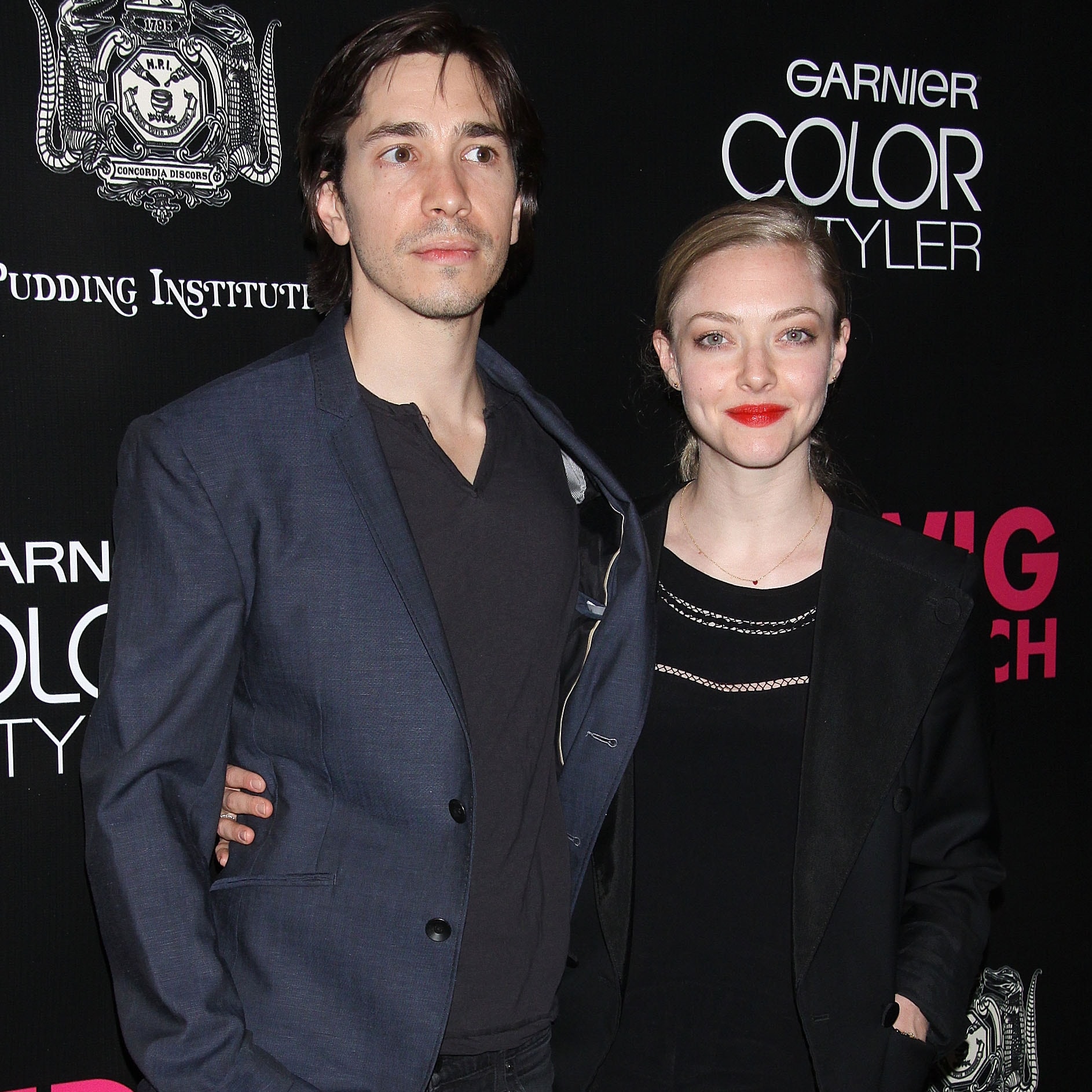 Amanda Seyfried has taken legal action over leaked photos from her vacation with Justin Long