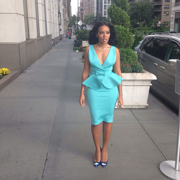 Angela Simmons' long black curls were elegantly draped over her shoulders