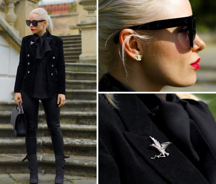 Olga Oliwye Soukupova of Everyday Runway wears a silver-toned bird brooch