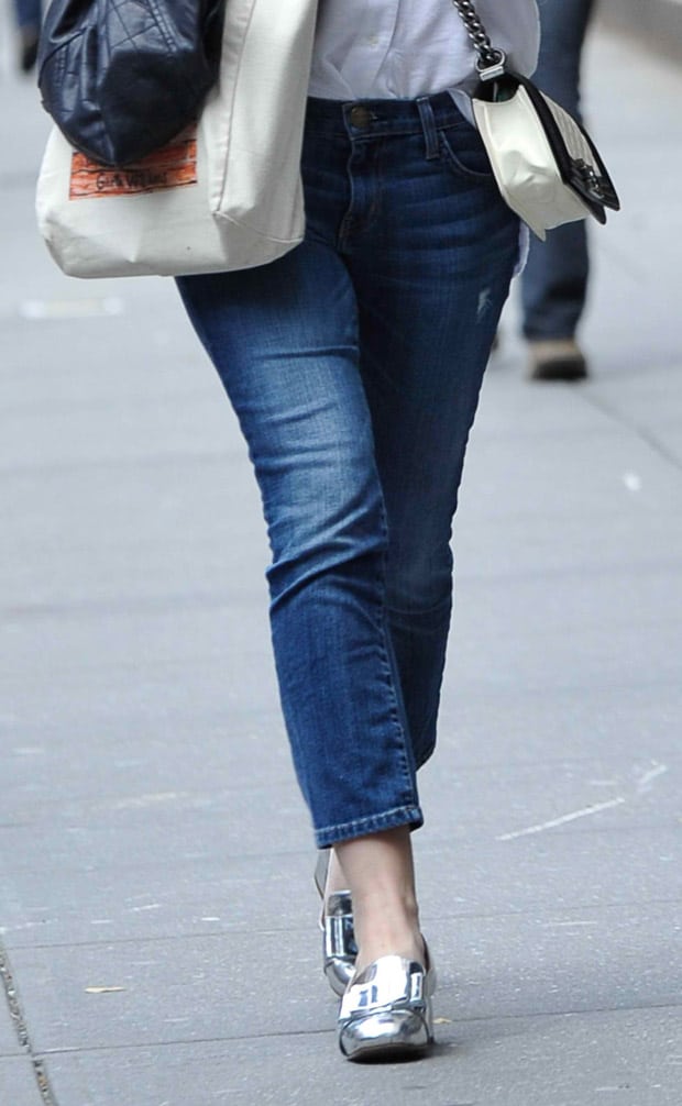 Dakota Fanning styled her cropped boyfriend jeans with silver metallic Miu Miu loafers