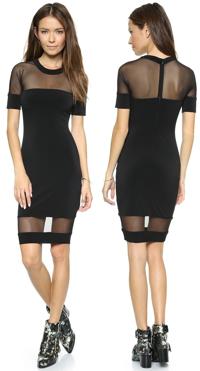 Delicate mesh trim reveals a peek of skin on a slinky jersey dress