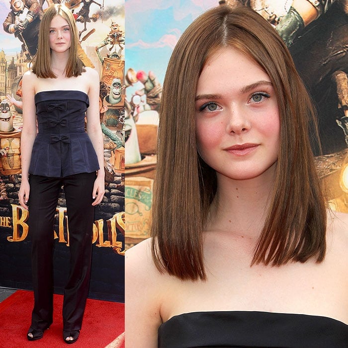 Elle Fanning not only dyed her hair a brown chestnut color but also bravely chopped it off to shoulder length