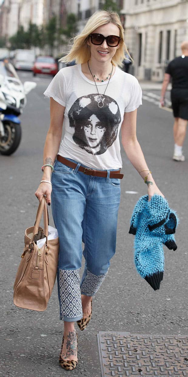 Fearne Cotton effortlessly combines patched denim jeans with a graphic face-printed t-shirt and animal print pumps, creating a bold and stylish streetwear look