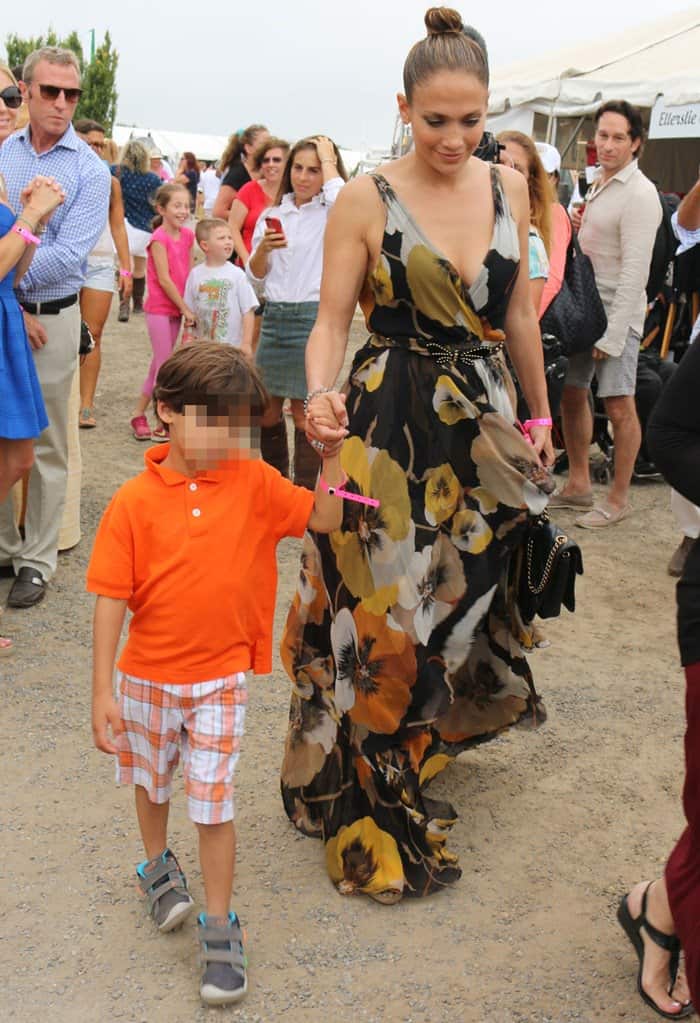 Jennifer Lopez dazzles in a Gucci maxi floral dress while attending the 39th Annual Hampton Classic Horse Show with her son, Maximilian David Muñiz