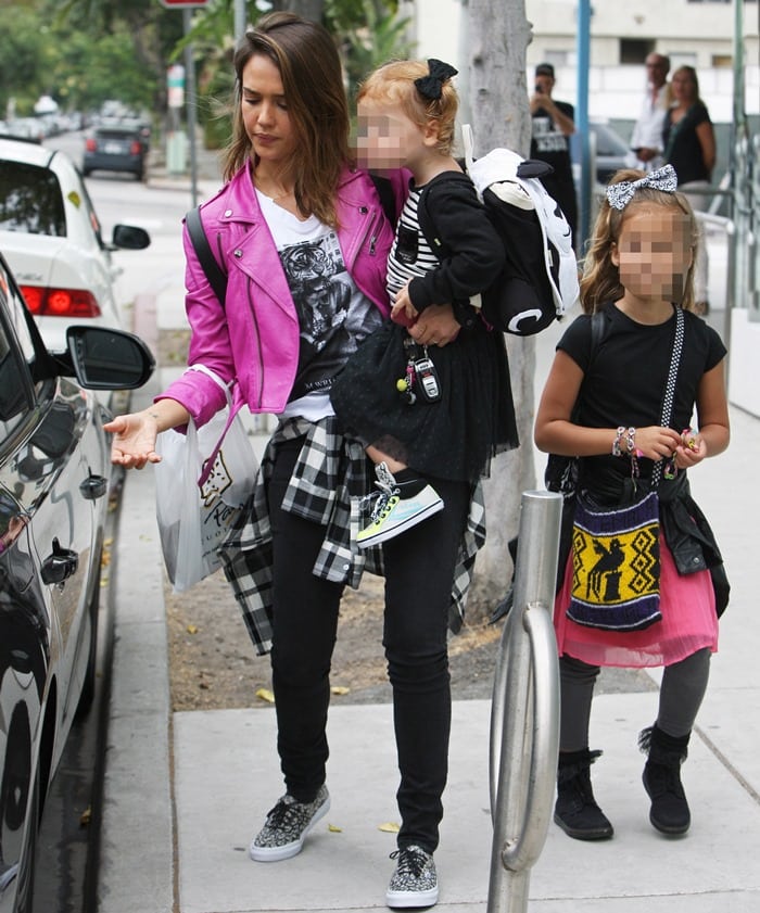Jessica Alba wearing a pink Hyacinth lambskin jacket from the Ralph Lauren Collection