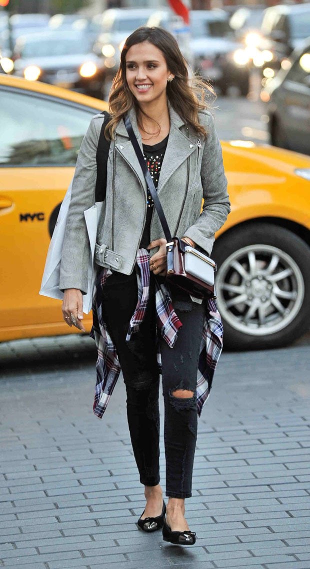 Jessica Alba wearing a grey IRO Jova leather jacket with Current/Elliott The Stiletto Jeans in Black Shredded